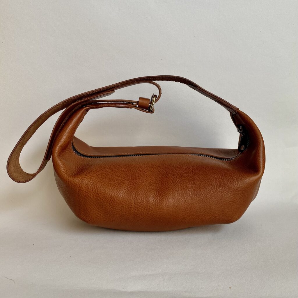 Luxury leather Sol Sling Bag